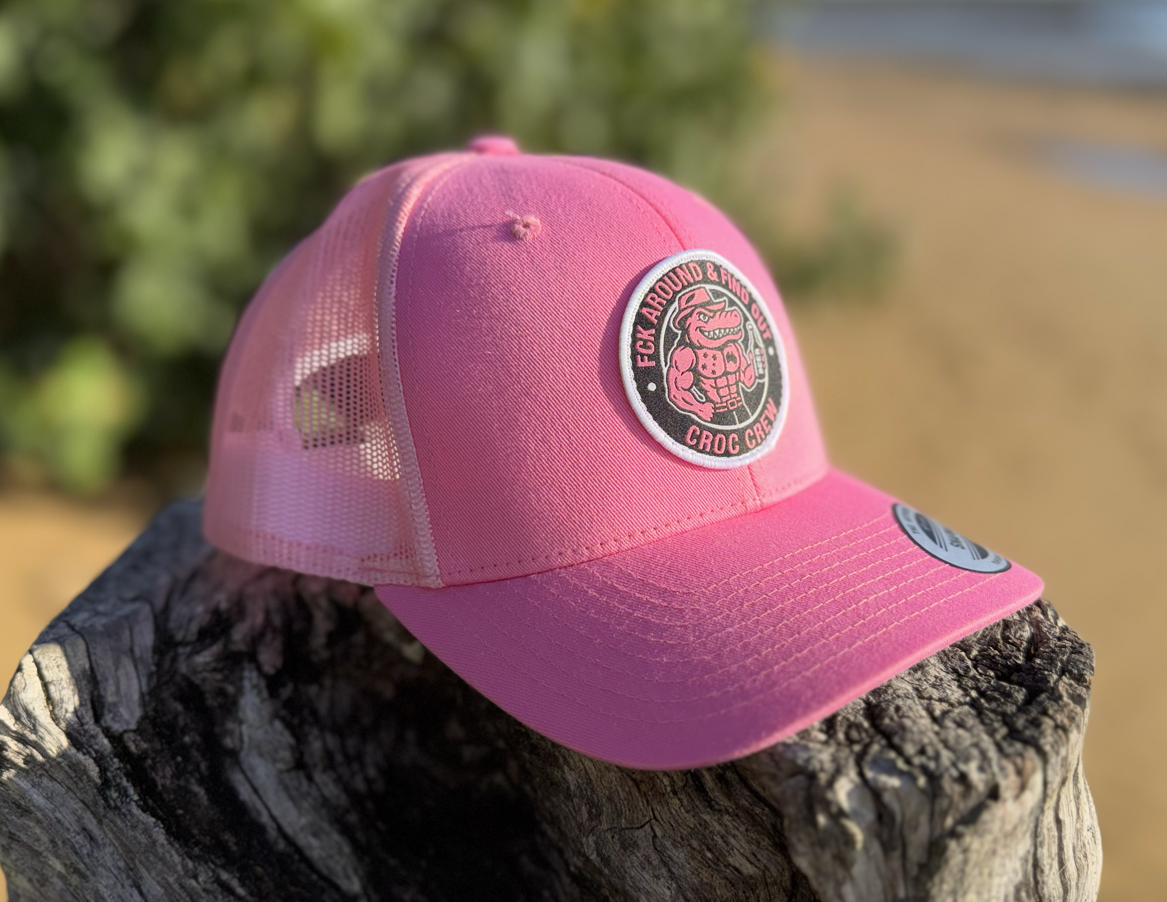 Croc Crew Pink Trucker Cap — Black & White Round FAFO Badge (Yupoong 6606C)