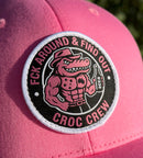 Croc Crew Pink Trucker Cap — Black & White Round FAFO Badge (Yupoong 6606C)